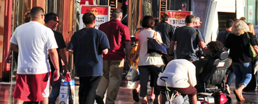 Tourists walking along the Las Vegas Strip.